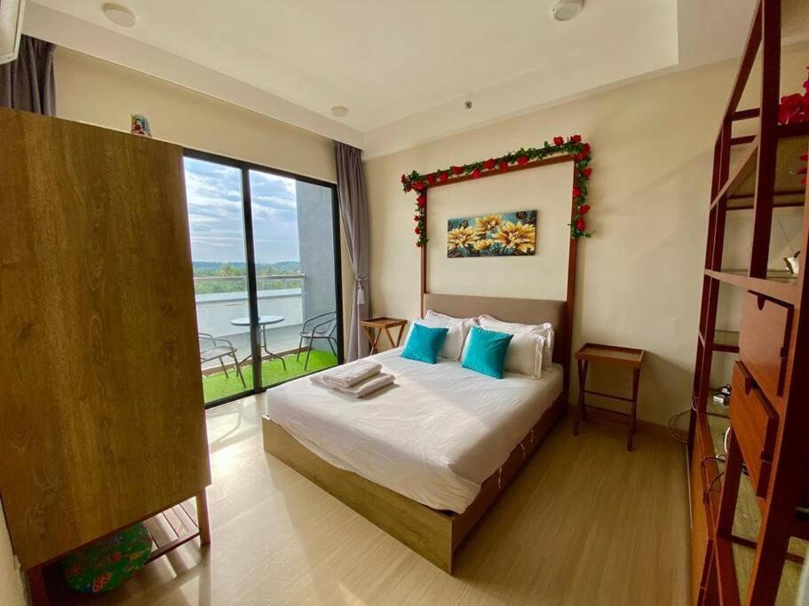 Cemara Rose Suite, Timur Bay Residence