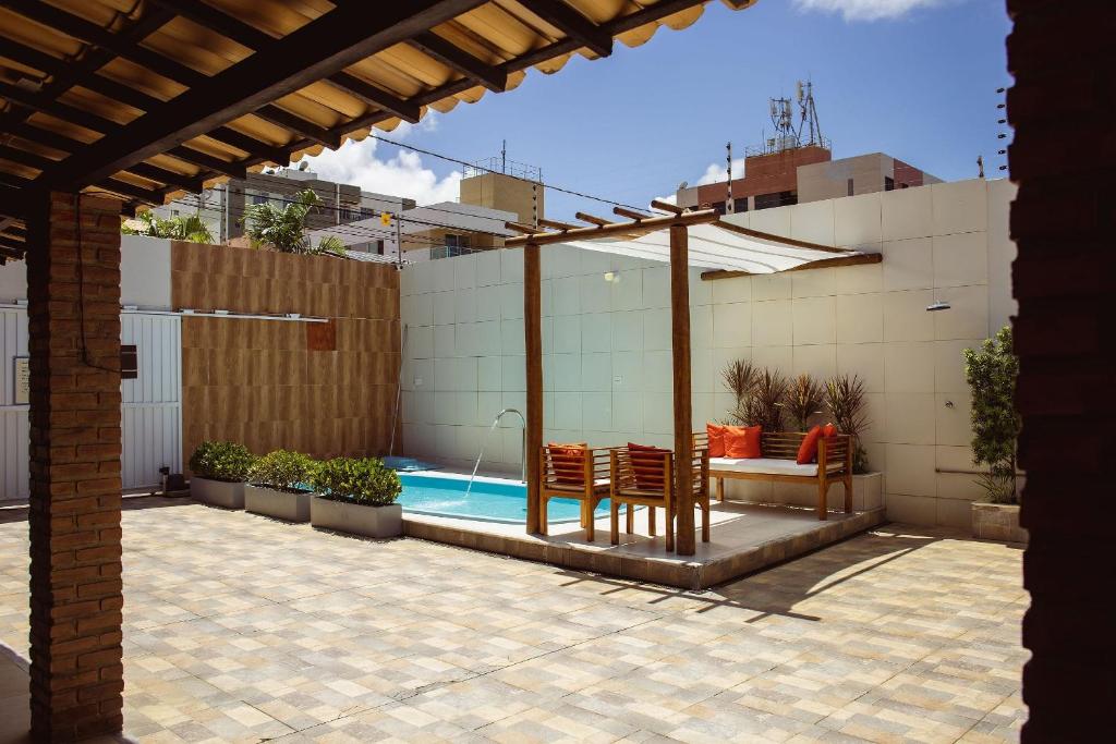 FLAT com 2 QUARTOS a 100m ORLA ATALAIA na TEMPORADA737 com PISCINA, CHURRASQUEIRA - Wi-Fi 180mbps e Cozinha