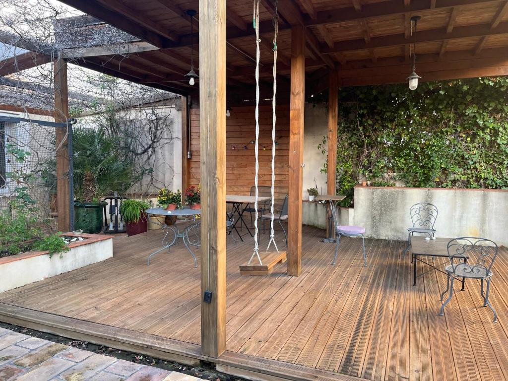 Maison chaleureuse avec grande terrasse